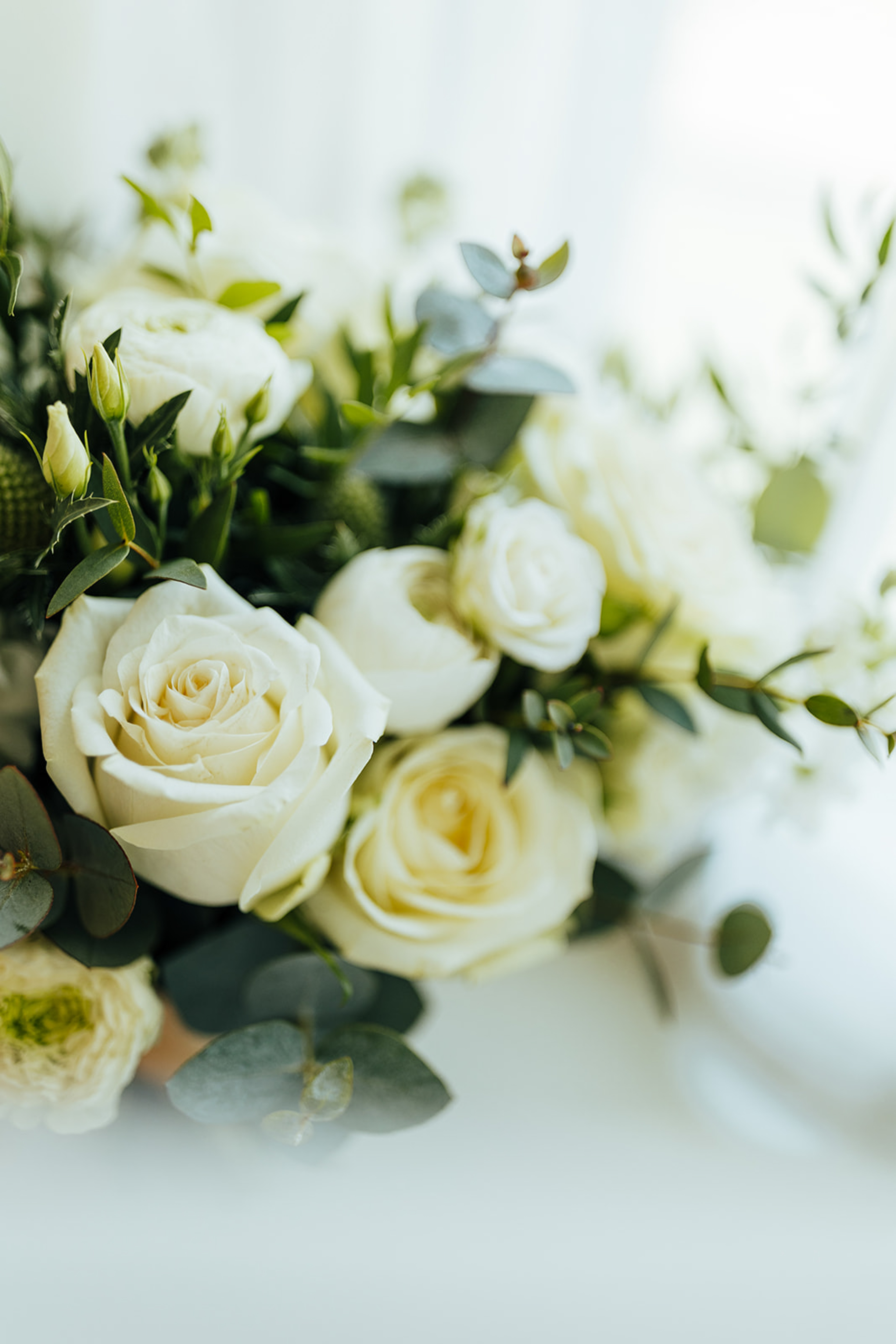 Minimal white and green bridal bouquet. Rushton Hall Wedding Photography. Documentary UK Wedding Photographer. Aimee Joy Photography.